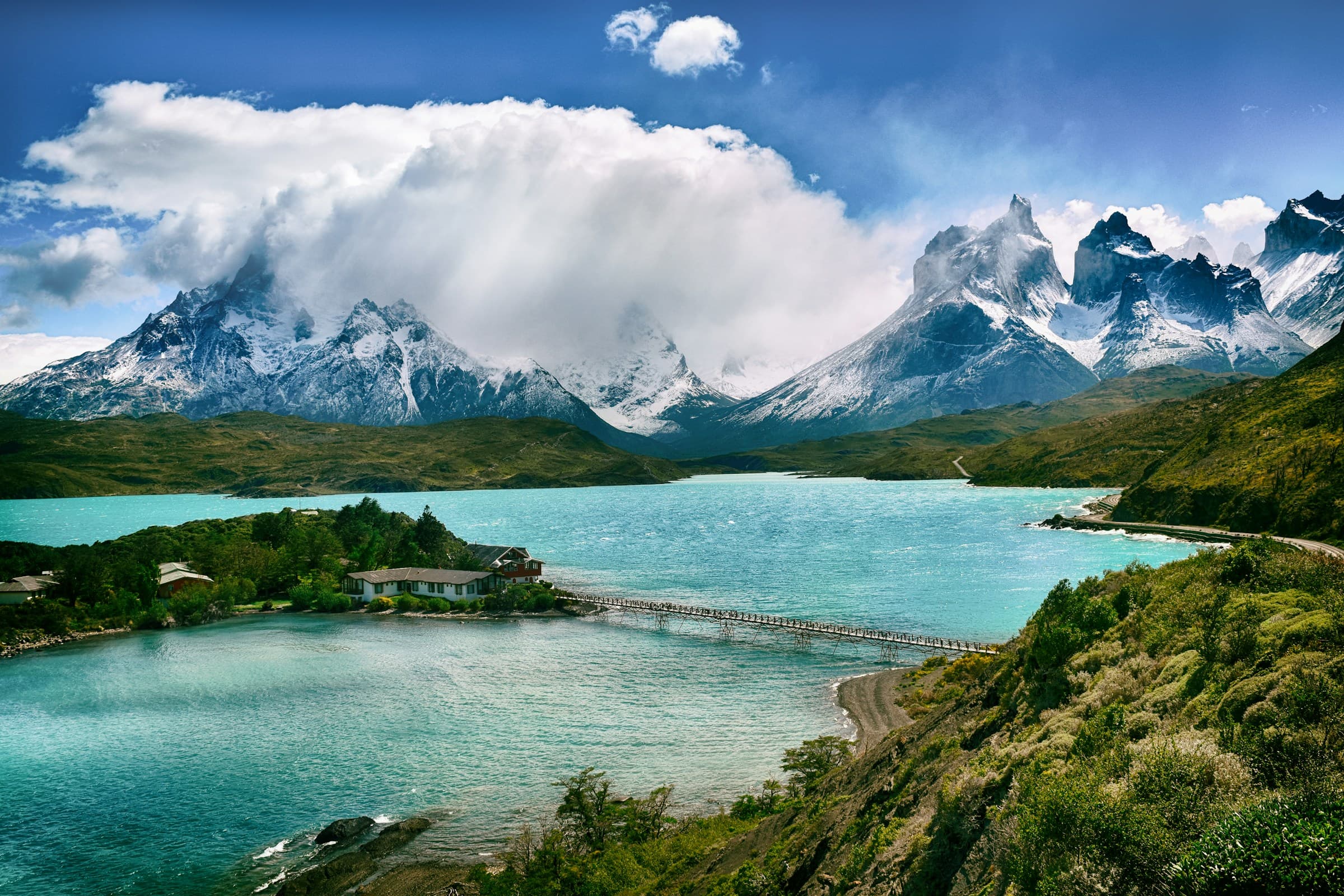 A glacial lake beneath snow-capped granite peaks in Torres del Paine National Park, Chile